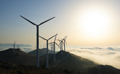 Wind farm in the mountains of Navarra. Wind turbines in the mountains of Leiza at sunset.