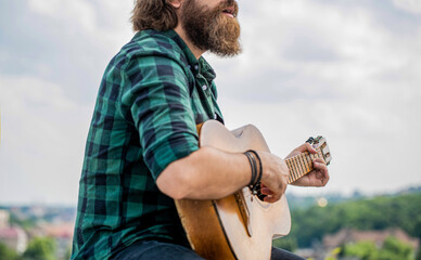 Acoustic guitars playing. Music concept. Guitars acoustic. Male musician playing guitar, music instrument. Man's hands playing acoustic guitar, close up