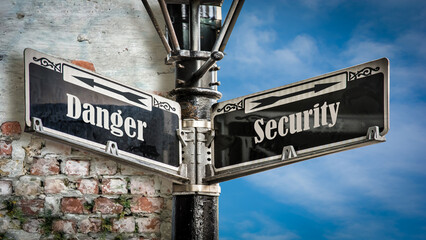 Obraz premium Street Sign to Security versus Danger