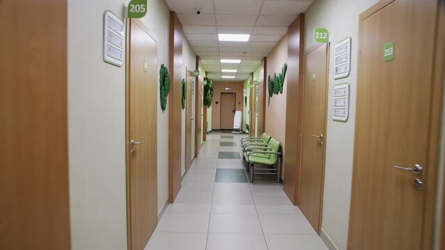 4K. Long empty corridor of the medical center building