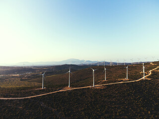 Windmills on a blue sky.