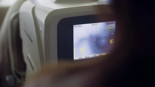 4K. A close-up of the eye is examined on a modern computer-controlled autorefractor.