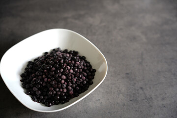 Closeup of blueberries, blackberry in bowl