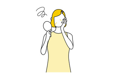 女性のAGA・薄毛、抜け毛を鏡で見て落ち込む女性