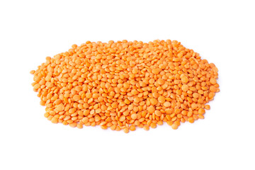A pile of orange lentil isolated over white background