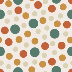 70 s seamless pattern. Retro colorful dots geometric seamless background in seventies style. Groovy scrapbook paper. Yellow, orange, brown, green colors vector pattern
