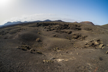 Typical volcanic landscape in the area of Caldera de Los Cuervos. Lanzarote, Canary Islands. Spain.
