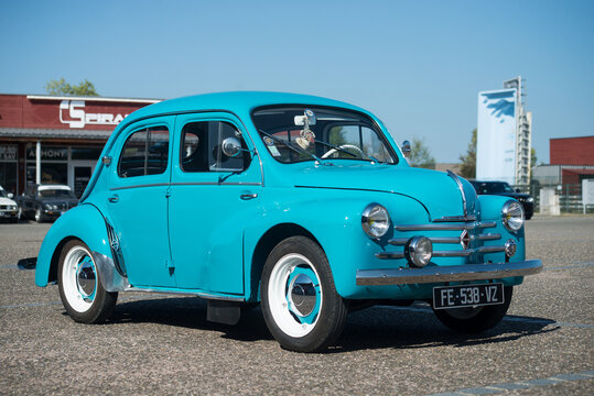 Lutterbach - France - 18 Aout 2022 - Front view of blue vintage Renault 4CV parked in the street
