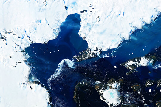 Melting ice in Antarctica, from space. Elements of this image furnished by NASA