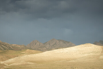 sand dunes and clouds