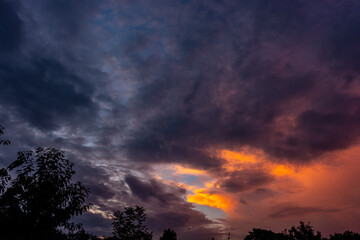 Fototapeta na wymiar Sunset against a stormy sky