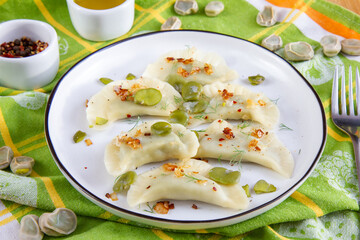  Homemade dumplings stuffed with broad beans. Vegetarian version of dumplings