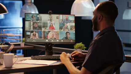 Business man meeting with people on videocall conference, talking on remote videoconference chat...