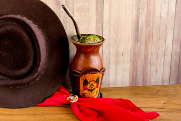 Gaucho tradition, hat, red scarf and yerba mate tea.