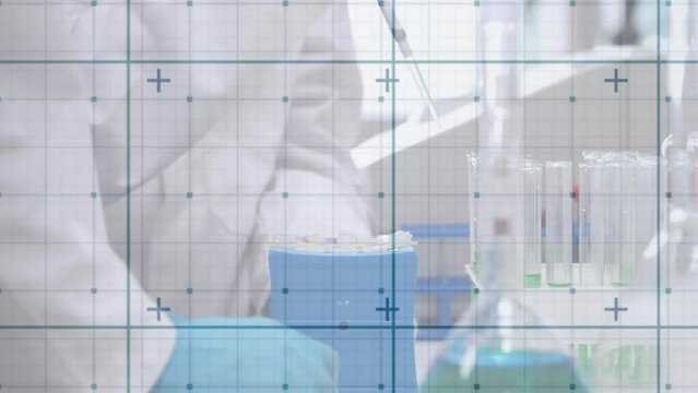 Animation of digital screen over hands of lab workers