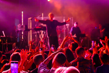 Crowd dancing near stage during concert
