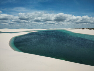 Beautiful view to blue rainwater lagoon and white sand dunes - obrazy, fototapety, plakaty