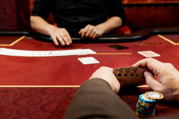 side view of men and women playing poker in a casino