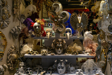 showcase with masks for the carnival of venice