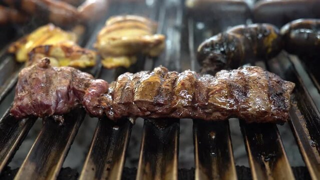 Excellent cut of meat burning on the grill