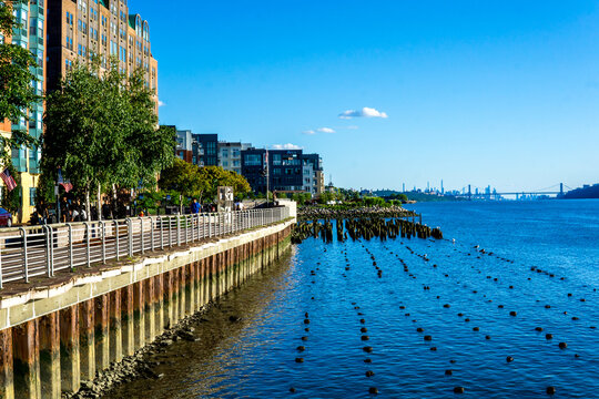 Yonkers, NY - Aug 13, 2022 Landscape view of redeveloped Yonkers waterfront. Lined with restaurants, luxury apartments and public spaces.