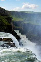 Golden Circle, Iceland - July 2, 2022 Vertical view of the iconic Gullfoss or golden falls. a waterfall located in the canyon of the Hvítá river in southwest Iceland.