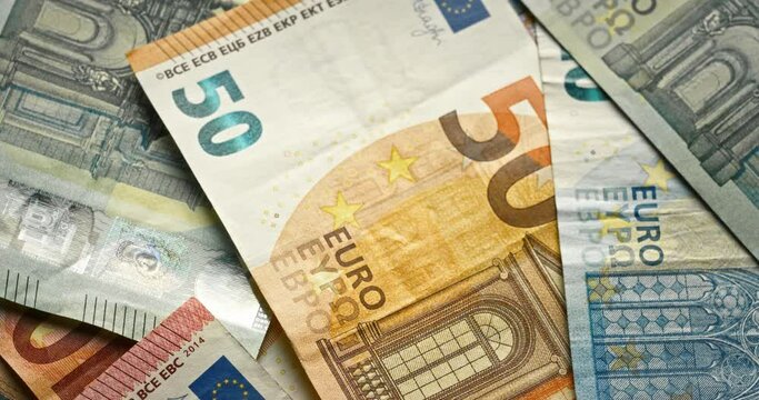 Many euro money bills. EU money banknotes. Close up. Slow motion. Bank credit. Money concept. European union currency. Inflation. Finance. Pile of euros. Economy. Investment. Income