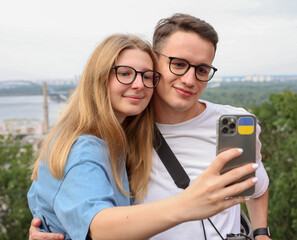 portrait of a couple on the background of the urban landscape