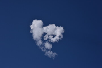 Smoke Plume cloud From Rocket Exhaust with a blue Sky  Clear sunny Day Fog and cloud atmosphere isolated