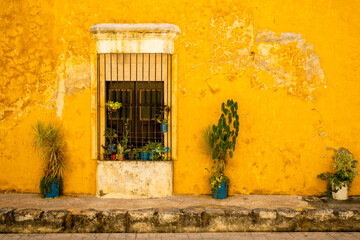 Typical old yellow house at the magical town of Izamal in Yucatan