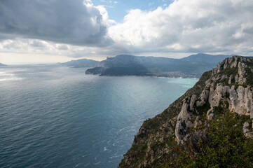 Fototapeta premium Touristic route D141 road from La Ciotat to Cassis, panoramic view on blue sea, limestone's cliffs and green pine forest, vacation in Provence, France