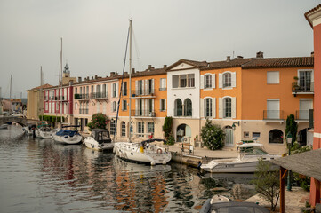 Colorful houses in Port Grimaud, village on Mediterranean sea with yacht harbour, Provence, France