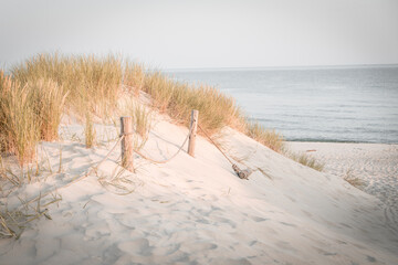 Sands on the Baltic Sea coast, entering to the beach. Slowinski National Park. Poland 