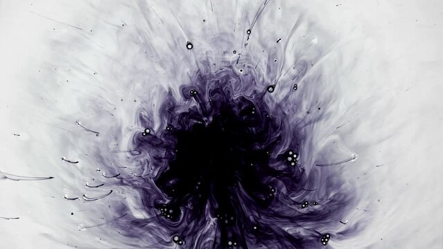 Color Ink drops and splatters on white background
