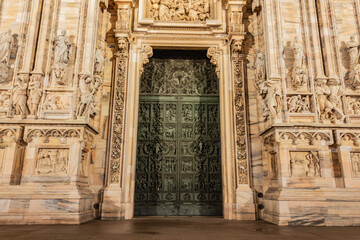 Naklejka premium the duomo de milano art pieces and space in gothic cathedral facade