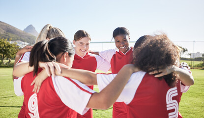 Female soccer, football or team huddle for support, motivation or celebration circle on sports field. Diverse group of fitness, teamwork and happy girls, friends or athletes at training match or game