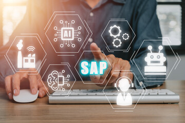 SAP - Business process automation software and management software (SAP), Person hand typing on...