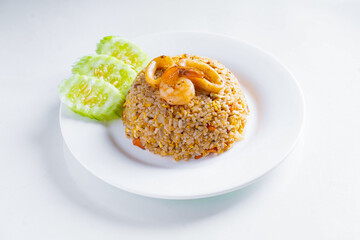 fried rice with seafood in white dish on white background, Thai food, isolated background