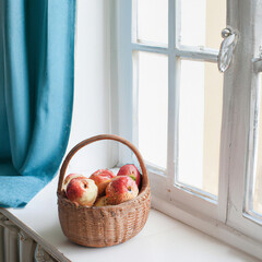 apples in a basket on the table