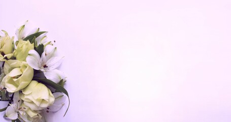 Yellow eustoma and white alstroemeria on a white background. Festive flower arrangement. Background for a greeting card.