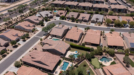 Afternoon aerial view of single family housing neighborhood near downtown Goodyear, Arizona, USA.