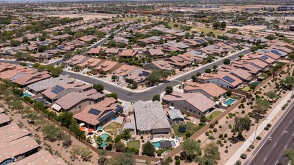 Fotobehang Afternoon aerial view of single family housing neighborhood near downtown Goodyear, Arizona, USA. © Matt Gush