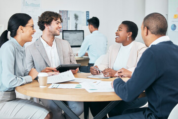 Diverse business marketing team enjoying casual chat during meeting in modern office, smiling and laughing. Happy colleagues planning and sharing idea or goal while discussing a strategy for startup