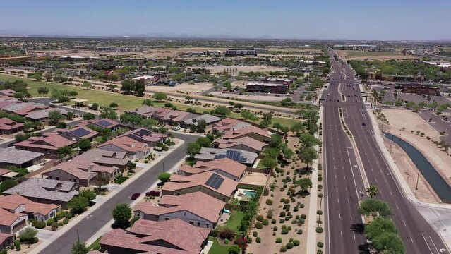 Afternoon aerial view of single family housing neighborhood near downtown Goodyear, Arizona, USA.
