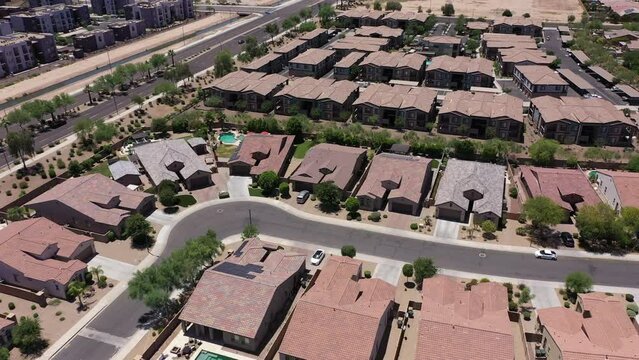 Afternoon aerial view of dense housing near downtown Goodyear, Arizona, USA.