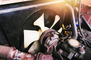 Forklift radiator cooling fan in the car repair shop.