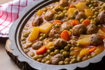Turkish Food Green Pea Stew with Meatballs - Kofte or Kofta Bezelye. (Turkish name; kofteli bezelye)