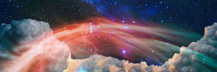 Night sky with clouds and stars.Fantasy in high resolution ideal for wallpaper. Elements of this image furnished by NASA