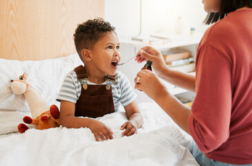 Sick child taking medicine syrup, flu treatment and cold cure for illness, sickness and virus...