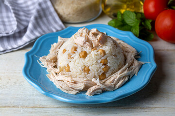 Traditional delicious Turkish food; Rice with chickpeas and chicken (Turkish name; Tavuklu nohutlu pilav or pilaf)